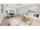 Spacious living room with stylish furniture, a ceiling fan, and an open floor plan at 1760 Mountclair Ct, Mount Dora, FL 32757
