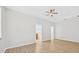 Main bedroom with ceiling fan and plank flooring at 1760 Mountclair Ct, Mount Dora, FL 32757