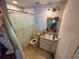 Bathroom with shower, sink, and toilet at 2656 Williston Dr, Lakeland, FL 33801