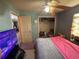 Bedroom with ceiling fan and open closet at 2656 Williston Dr, Lakeland, FL 33801
