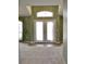 Spacious foyer with high ceilings and bright double front doors at 3629 Welsh Way, Lakeland, FL 33813