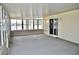 Enclosed lanai with ceiling and light fixture at 3629 Welsh Way, Lakeland, FL 33813