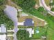 An aerial view of the home showcasing the backyard, neighboring properties, and surrounding area at 4189 Homestead Dr, Lakeland, FL 33810