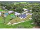 Drone shot capturing the home from above, emphasizing the generous lot size and neighborhood's charm at 4189 Homestead Dr, Lakeland, FL 33810