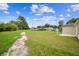 Expansive backyard space offering potential for landscaping and outdoor activities at 4189 Homestead Dr, Lakeland, FL 33810