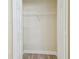 Interior of a closet featuring a single shelf and neutral paint at 4189 Homestead Dr, Lakeland, FL 33810