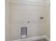 Laundry room with utility connections and a wire shelf for storage at 4189 Homestead Dr, Lakeland, FL 33810