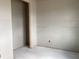A bedroom in progress showcasing the initial stages of development, awaiting your personal touch to transform the space at 2244 Broadbrook Drive, St Cloud, FL 34771