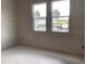 A bedroom in progress, well lit, with an outside view ready to make your own at 2244 Broadbrook Drive, St Cloud, FL 34771