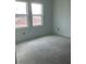Bright bedroom featuring fresh paint, a window letting in light, and electrical outlets installed at 2373 Broadbrook Drive, St Cloud, FL 34771