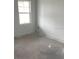 Bright bedroom featuring fresh paint, a window letting in light, and electrical outlets installed at 2373 Broadbrook Drive, St Cloud, FL 34771