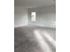 Unfinished living room with lots of natural light through window at 2373 Broadbrook Drive, St Cloud, FL 34771