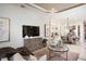 Spacious living room featuring elegant decor, stylish furniture, and an open layout for modern living at 852 Arbor Green Trl, St Cloud, FL 34771