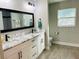 Modern bathroom with double vanity and updated fixtures at 9320 Se 163Rd St, Summerfield, FL 34491