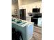 Updated kitchen featuring stainless steel appliances and marble countertops at 9320 Se 163Rd St, Summerfield, FL 34491