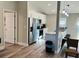 Open concept kitchen with breakfast bar and stainless steel appliances at 9320 Se 163Rd St, Summerfield, FL 34491