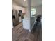 Modern kitchen with stainless steel appliances and an island at 9320 Se 163Rd St, Summerfield, FL 34491