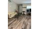 Bright living room with hardwood floors and ample natural light at 9320 Se 163Rd St, Summerfield, FL 34491