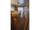 Bright bedroom with hardwood floors, access to a balcony, and ample closet space at 2514 Sage Dr, Kissimmee, FL 34758
