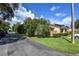 Townhouse exterior with lush landscaping at 1226 Charter Oaks Cir, Daytona Beach, FL 32117