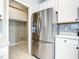 The kitchen has stainless steel appliances and plenty of cabinets at 319 Ravenshill Way, Deland, FL 32724