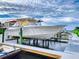 Boat lift in a marina setting at 520 S Peninsula Ave # 2D7, New Smyrna Beach, FL 32169