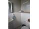 Bathroom featuring wainscoting, updated fixtures, and decor at 1628 Paradise Ln, Astor, FL 32102