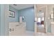 Bathroom features a soaking tub and access to the bedroom at 3 Oceans West Blvd # 5C4, Daytona Beach Shores, FL 32118