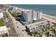 Picture perfect aerial view of condominiums with ocean access and covered parking for residents at 1415 Ocean Shore Blvd # 309, Ormond Beach, FL 32176