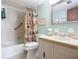 Bathroom featuring a shower and tub combination with updated vanity at 1415 Ocean Shore Blvd # 309, Ormond Beach, FL 32176