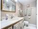 Bathroom featuring a shower, vanity, and decorative towels at 1415 Ocean Shore Blvd # 309, Ormond Beach, FL 32176
