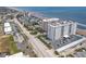 Aerial view of the condo, showing the building and the surrounding area at 1415 Ocean Shore Blvd # 309, Ormond Beach, FL 32176