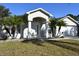 Front view of a one-story house with a covered entryway at 1562 Pendleton St, Deltona, FL 32725