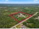 Aerial view showcasing home and large lot at 32200 Ponderosa Ave, Deland, FL 32720