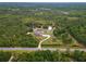 Aerial view of property highlighting home, lot, and road access at 32200 Ponderosa Ave, Deland, FL 32720