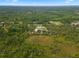 Aerial view showing home's location on a spacious lot at 32200 Ponderosa Ave, Deland, FL 32720