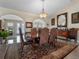 Elegant dining room with a large table and ornate chairs at 32200 Ponderosa Ave, Deland, FL 32720