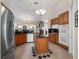 Spacious kitchen with granite countertops and wooden cabinets at 32200 Ponderosa Ave, Deland, FL 32720