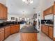 Large kitchen featuring granite island and stainless steel appliances at 32200 Ponderosa Ave, Deland, FL 32720