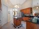 Bright kitchen with granite countertops and an island at 32200 Ponderosa Ave, Deland, FL 32720