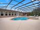 Relaxing pool and spa with covered patio at 32200 Ponderosa Ave, Deland, FL 32720