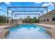 Large, refreshing pool and spa with covered patio at 32200 Ponderosa Ave, Deland, FL 32720