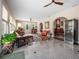 Bright sunroom featuring ample natural light and seating at 32200 Ponderosa Ave, Deland, FL 32720