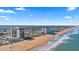 Scenic aerial shot of beach condos, highlighting ocean views, coastline, and proximity to the beach at 1513 Ocean Shore Blvd # 7B, Ormond Beach, FL 32176