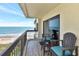 Inviting balcony with comfortable seating and stunning ocean views for relaxing and enjoying the scenery at 1513 Ocean Shore Blvd # 7B, Ormond Beach, FL 32176