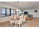 Charming dining area with ocean views, adjacent to the living room and balcony at 1513 Ocean Shore Blvd # 7B, Ormond Beach, FL 32176