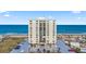 Beautiful condo building with ocean view, landscaped grounds, and ample parking at 1513 Ocean Shore Blvd # 7B, Ormond Beach, FL 32176