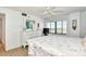 Comfortable main bedroom with large windows offering lots of natural light at 1513 Ocean Shore Blvd # 7B, Ormond Beach, FL 32176
