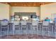 The open-air bar area offers modern seating, TVs, and a wide selection of drinks at 505 Ocean Course Ave # 505, Davenport, FL 33896