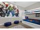 Fun ' bedroom features a bunk bed and vibrant Marvel comic character wallpaper at 505 Ocean Course Ave # 505, Davenport, FL 33896